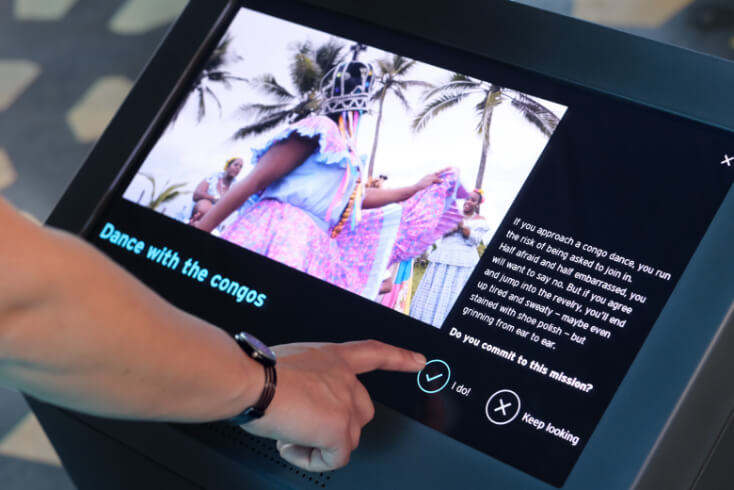 Celebrating biodiversity for Biomuseo Panama visitors interact with monitor screens of final gallery