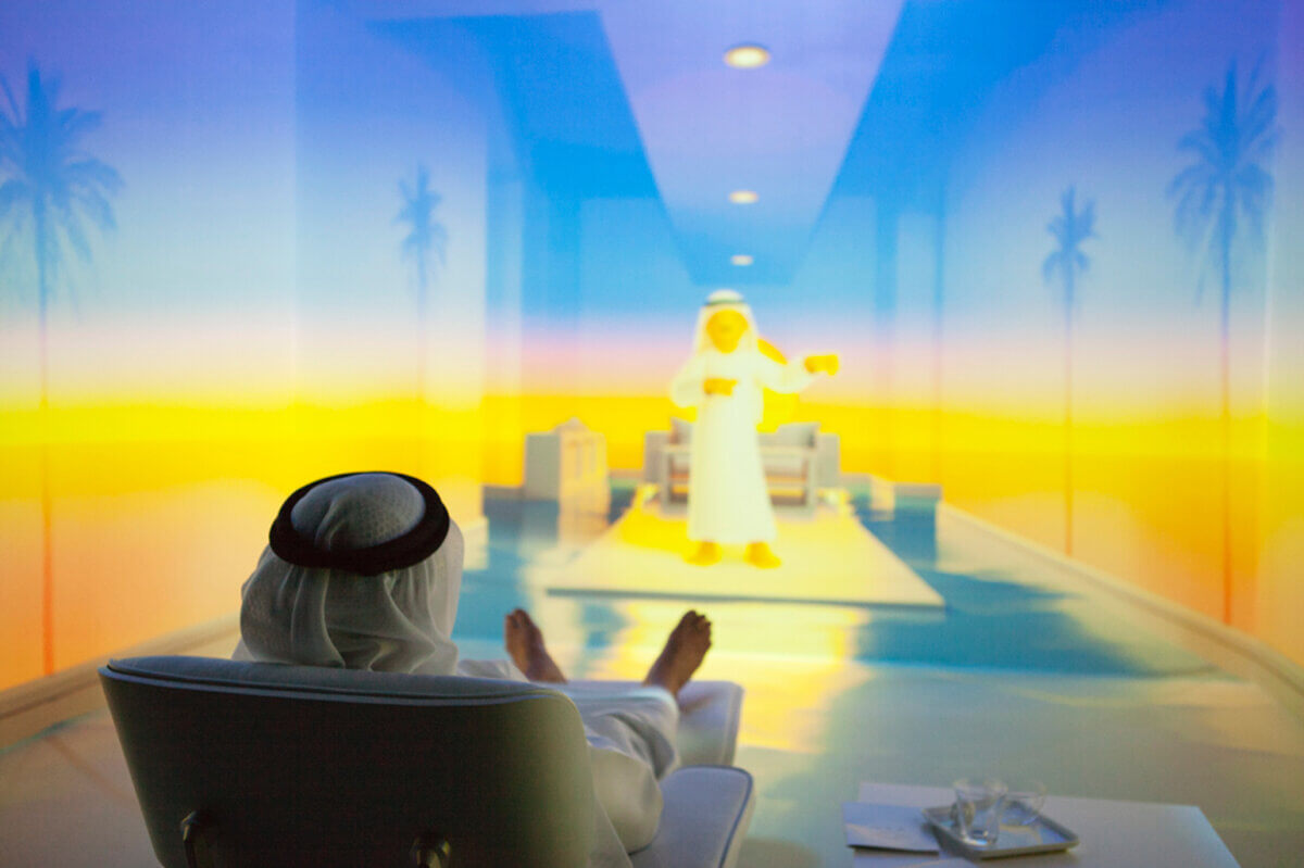 Our future life with intelligent machines Museum of the Future Dubai visitor using lounge chair in Care Room interactive AI virtual reality experience